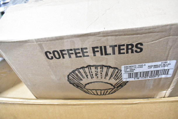 Cardboard box labeled "COFFEE FILTERS," with BrewRite 15x5.5, assembled in USA. Part of a 30-item auction lot.