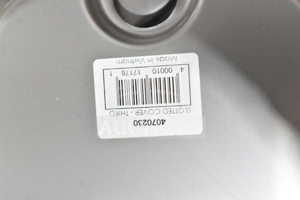 Label on item indicating it's a slotted cover, third, with barcode and number 4070230. Made in Vietnam.
