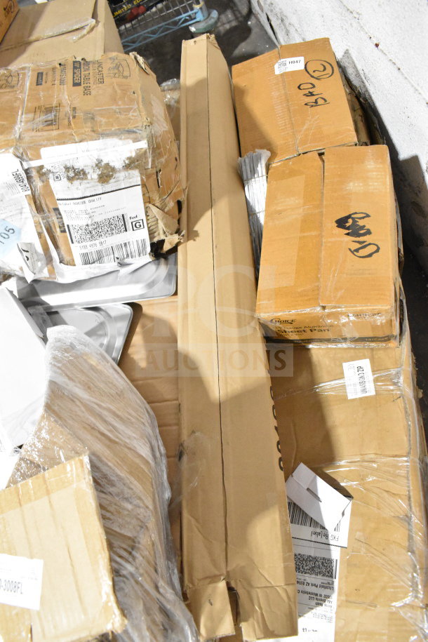 Various boxed items including Crathco hoppers, Choice sheet pans, coffee filters, exit signs. Boxes show signs of wear.