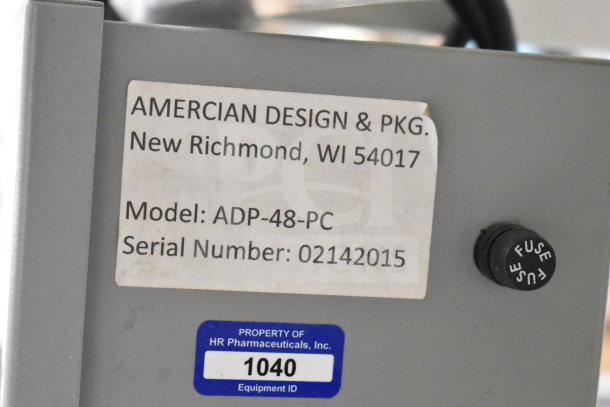 American Design ADP-48-PC rotary table, 115V, 1 phase, commercial casters. Label indicates model and serial number.