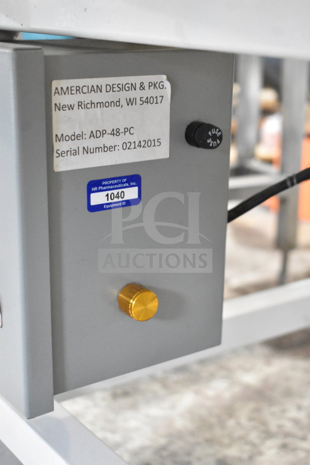 2 American Design ADP-48-PC rotary tables on casters, 115V, 1 phase. Labels show model, serial number, and equipment ID.