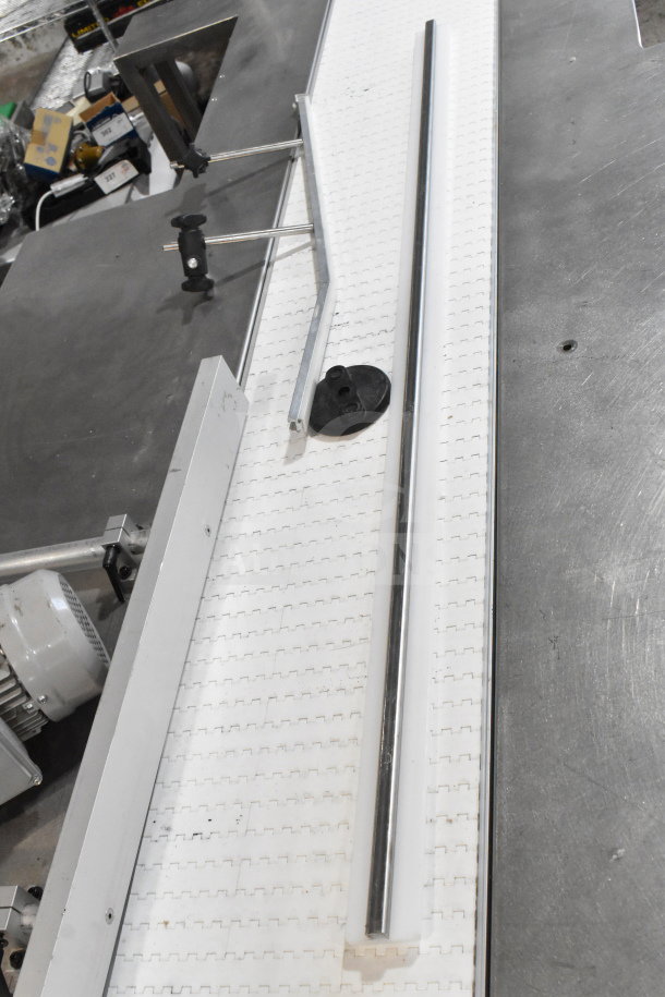Dorner 32MTEM12 floor style conveyor with table, 115V, 1 phase, shown in excellent condition with metal railings.