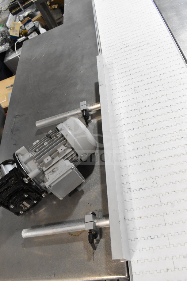 Dorner 32MTEM12 floor style conveyor with table, featuring a white belt and motor, 115 volts, 1 phase.