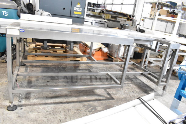 Dorner 32MTEM12 floor conveyor with table, stainless steel frame, 115V, 1 phase; excellent condition.