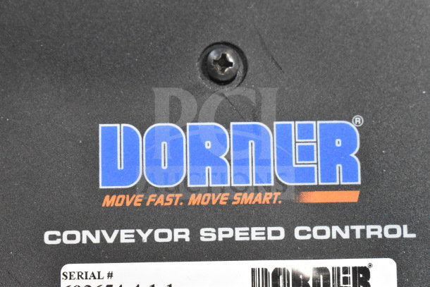 Dorner 32MTEM12 floor style conveyor speed control panel with branding and serial number visible.