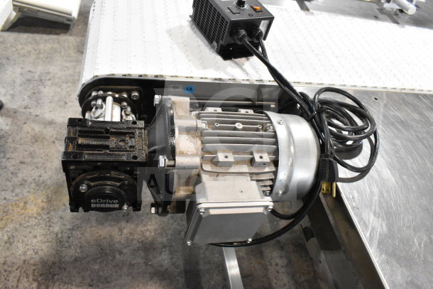 Dorner 32MTEM12 floor-style conveyor with table, 115V, 1 phase. Features eDrive motor, visible wiring and control box.