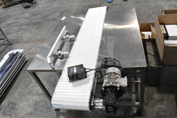 Dorner 32MTEM12 floor conveyor with table, 115 volts, 1 phase, metal finish, in good condition with visible motor and controls.