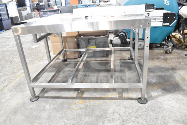Dorner 32MTEM12 Floor Style Conveyor with table, 115 volts, 1 phase. Metal frame, industrial setting, good condition.