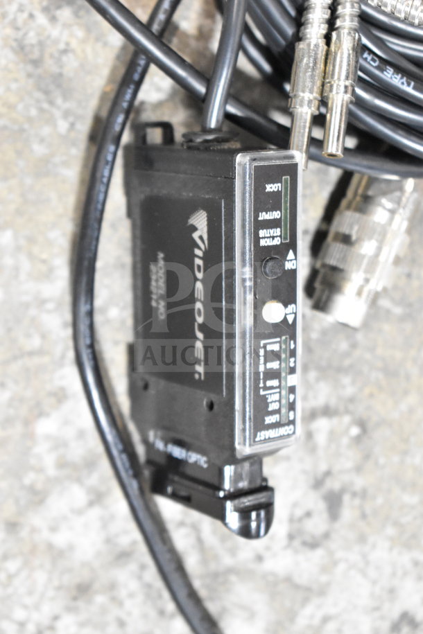 VideJet device with model No. D315-J, featuring fiber optic connectors and contrast settings. Includes cables. Ideal for technical use.