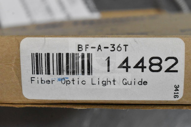 2 Boxes of various items including a wash station kit, 25-way I/O breakout cable, and BF-A-36T fiber optic light guide.