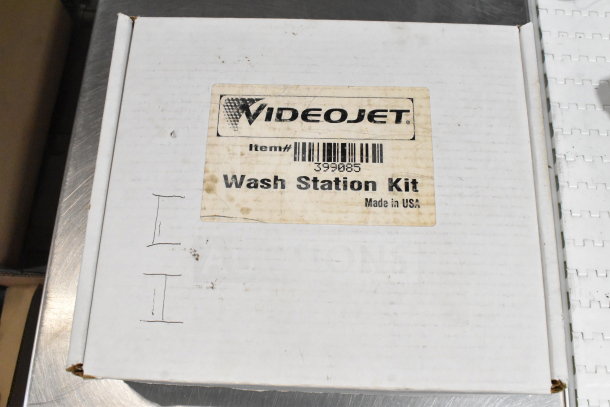 Videojet Wash Station Kit box with label, item #399985, Made in USA, part of 2-box auction lot including tech accessories.