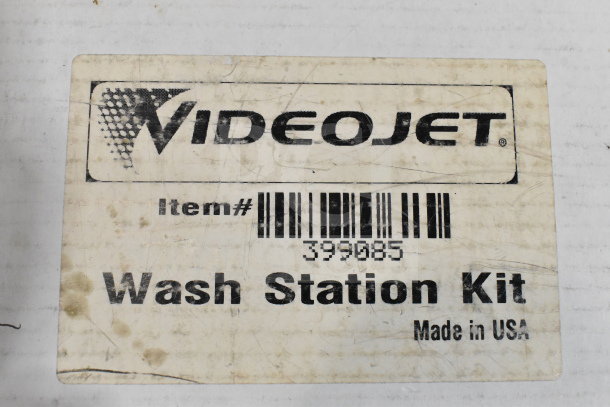 Videojet Wash Station Kit label, item #399085, "Made in USA," visibly worn on a box of auction items.
