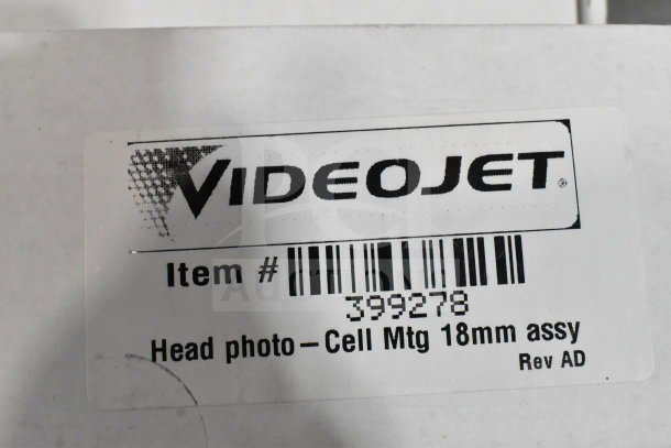 VideoJet label showing item number 399278, "Head photo - Cell Mtg 18mm assy," with barcode and branding.