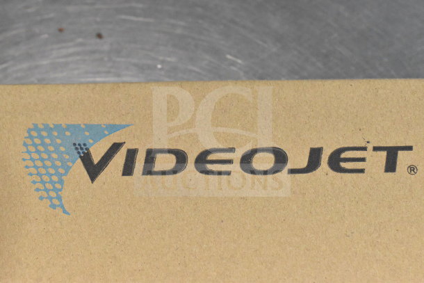 VideoJet branded cardboard box, part of a lot including VideoJet head photo, label sensor, septum assembly, and printhead mounting.