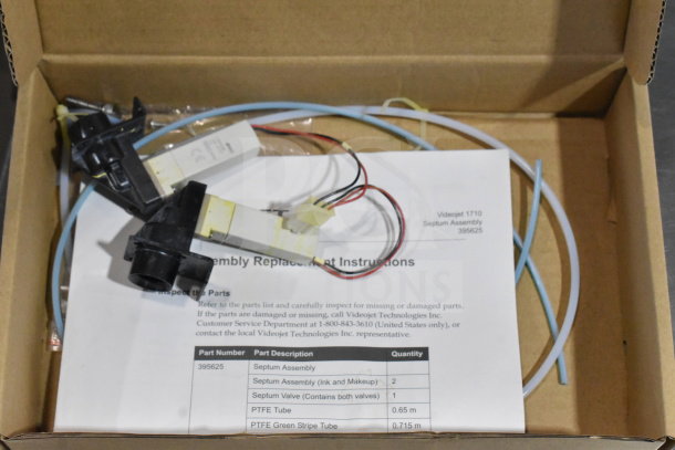 Box with various VideoJet components including a head photo, label sensor, septum assembly, and printhead mounting. Includes cables and instructions.