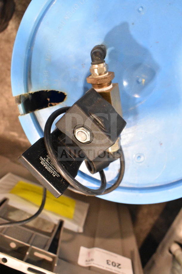 Bin containing water buckets and water filter with filtration attachment. "ALL ONE MONEY!" auction label visible.