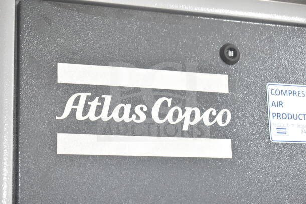 Atlas Copco GA11VSD Rotary Screw Air Compressor, gray exterior, model labeling, in good condition.