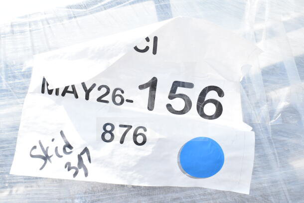 "Label reading MAY26-156 and Skid 397 on packaging for 20 Lancaster Table & Seating chairs."
