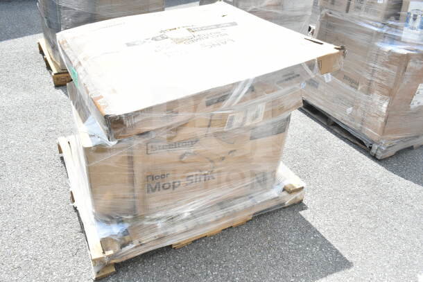 Pallet with new scratch and dent items, including Steelton floor mop sink and wire shelf, wrapped in clear plastic.