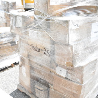 Sealed pallet of 34 new items including glasses, salad bowls, coffee cups, server plates, and carafe. Marked "JUN26-25."