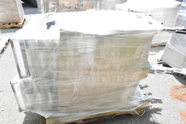 Shrink-wrapped pallet of 20 Lancaster Table & Seating square back banquet chairs, black vinyl, silver vein frame, unassembled.