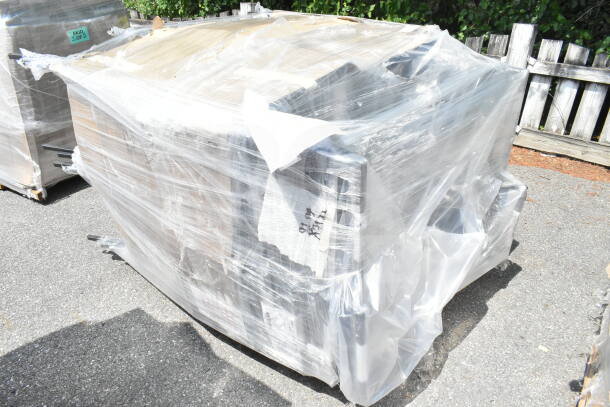 Plastic-wrapped pallet of 20 new Lancaster Table & Seating Square Back Banquet Chairs, black vinyl and silver vein frame, scratch and dent condition.