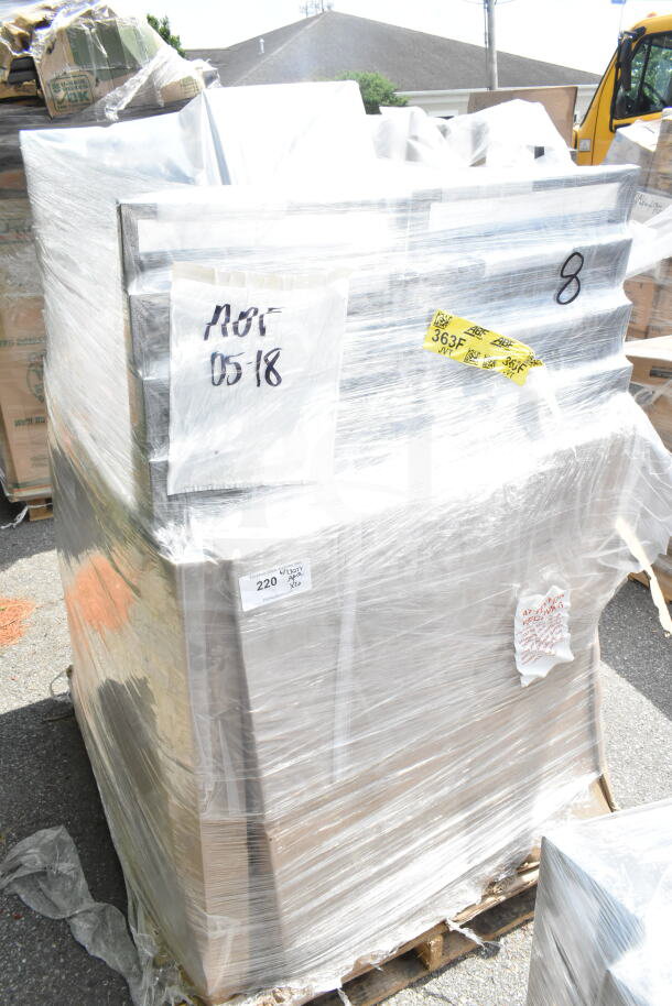 Pallet of 20 new scratch and dent Lancaster banquet chairs wrapped in plastic, with visible labels for auction lot JUN26-01.