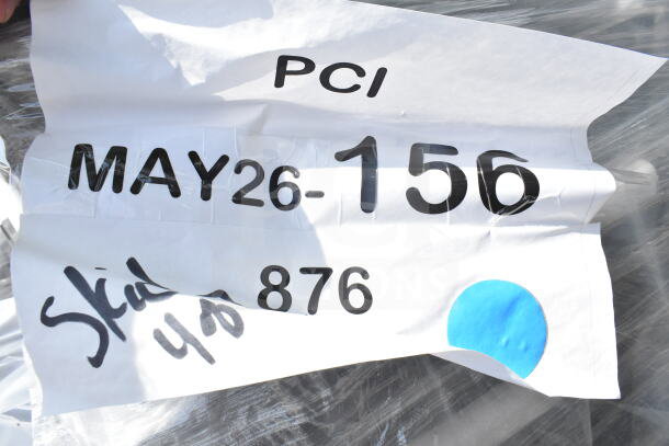 "Package with label 'MAY26-156', 'Skid 48', and number '876' for auction. Contains 20 new scratch and dent chairs."