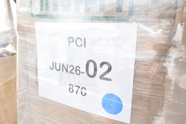 Pallet wrapped items with a label reading "PCI JUN26-02 876" for auction. Items include new scratch and dent pieces.