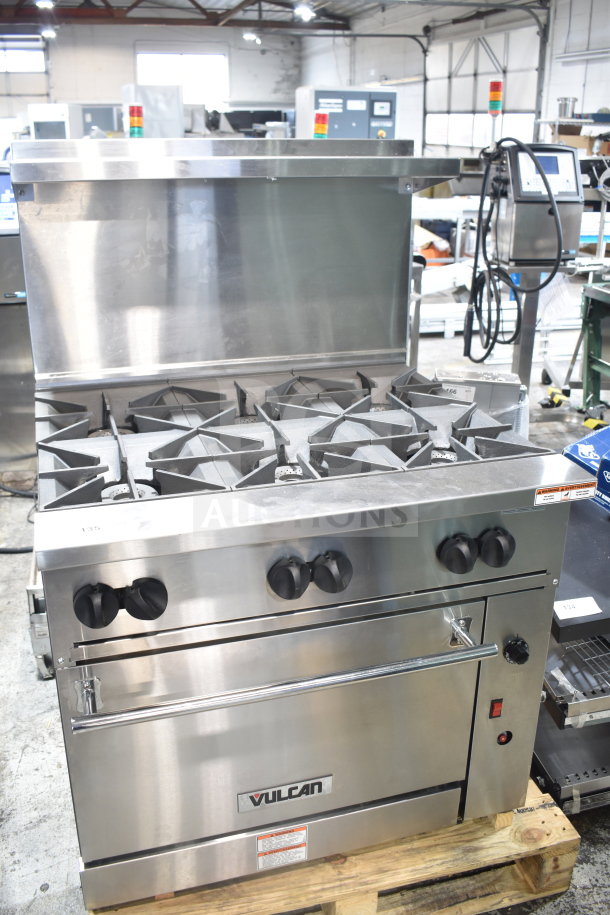 Brand new Vulcan 36C-6BP 6 burner liquid propane range with convection oven, 215,000 BTU, minor scratches.