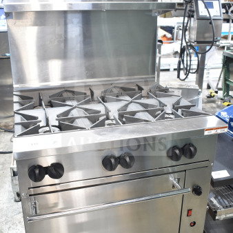 Brand new Vulcan 36C-6BP 6 burner liquid propane range with convection oven, 215,000 BTU, minor scratches.