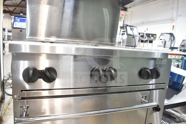 Brand new 2025 Vulcan 36C-6BP liquid propane range, 6 burners, convection oven base, 215,000 BTU, minor scratches.