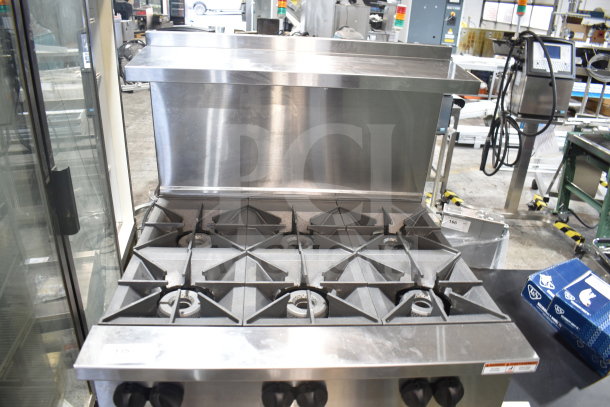 Brand new Vulcan 36C-6BP, 6-burner, 36" liquid propane range with convection oven, 215,000 BTU, scratch and dent condition.