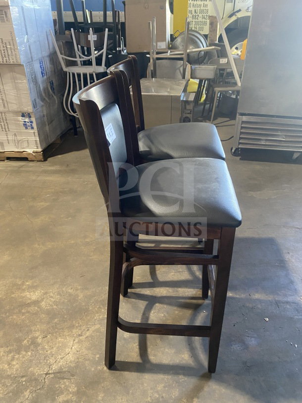 Brand new mahogany finish bar stool with cushion back, black vinyl seat. Commercial quality, durable, stylish design.