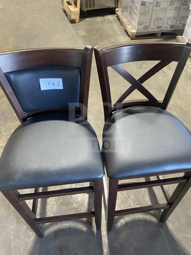 Brand new mahogany finish wood bar stool with black vinyl seat, cushion back, commercial quality. Includes 2 stools.