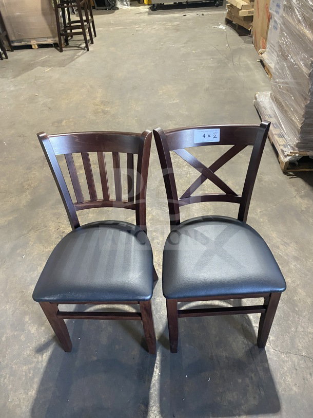 Brand new mahogany finish wood dining chairs with black vinyl seats, commercial quality. Set includes two chairs, tag shows quantity "4 X 2".