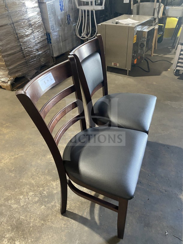 Brand new commercial mahogany wood dining chairs, table-height, with black vinyl seats. Durable, elegant design.