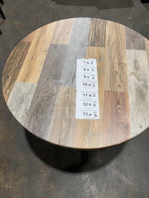 Brand new Durowood DW42 36" round dining table with barn wood plank composite top and polished base. Tags show auction info.