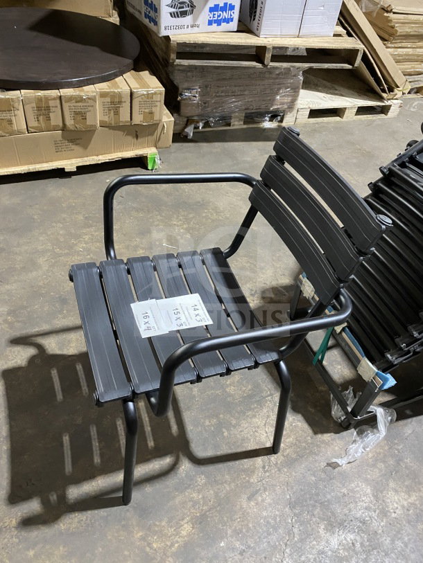 BRAND NEW Houe ReClips stacking recycled polymer outdoor dining armchair, black, with labels indicating dimensions.