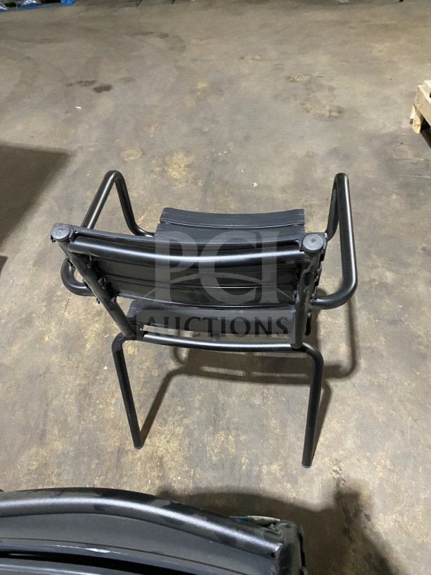 BRAND NEW Houe ReClips outdoor dining armchair in recycled polymer, stackable design, black frame, pristine condition.