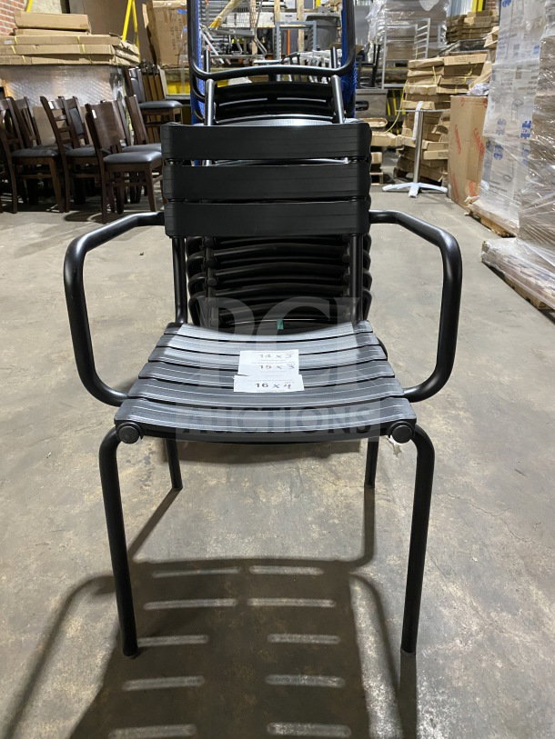 BRAND NEW Houe ReClips recycled polymer outdoor dining armchair. Features stackable design and sleek black finish.