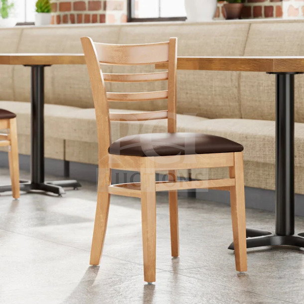 Brand new commercial natural wood ladder back chair with dark brown vinyl seat. Assembled, ready for use.
