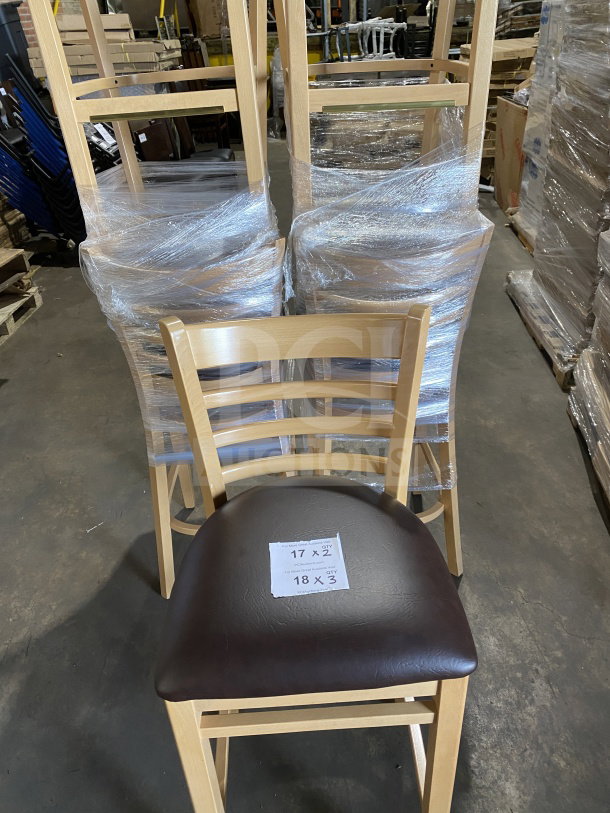 Brand new commercial wood ladder back chair with a natural finish and dark brown vinyl seat. Assembled, tag shows quantity info.