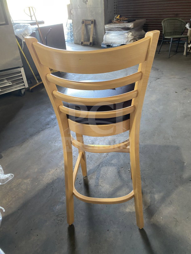 Brand new commercial wood ladder back chair, natural finish, dark brown vinyl seat, fully assembled, ready for use.