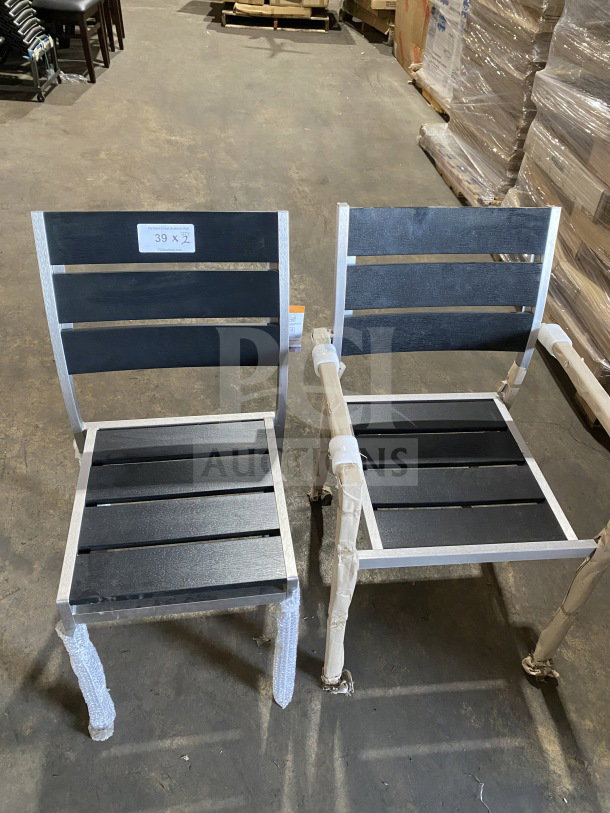 Brand new commercial outdoor teak chairs with black slats, wrapped legs, visible number label "39 x 2."