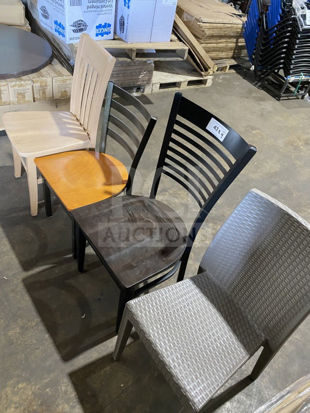 Four brand new bar height chairs in varying designs and finishes, labeled "43" for auction.