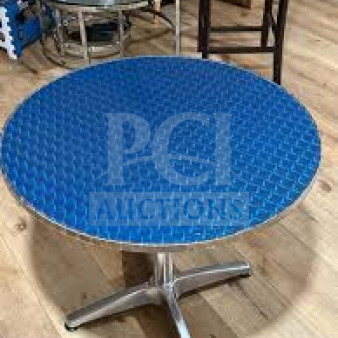 Brand new commercial stainless steel cocktail table, model D36, with a wrapped plate top and polished base, in mint condition.