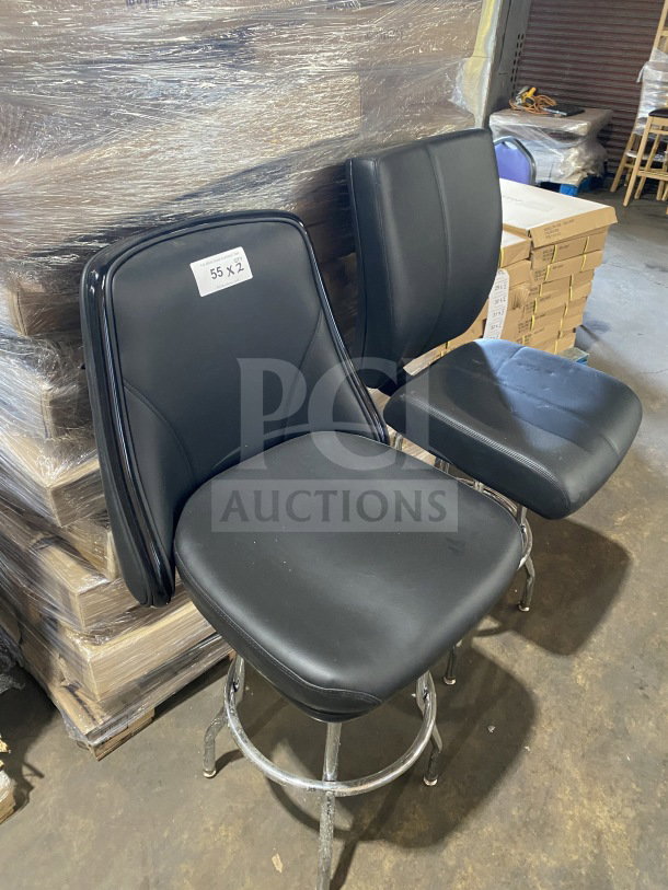 Brand new commercial chrome frame swivel bar stool with black vinyl bucket seat, tag marked "55 X 2," set of two.