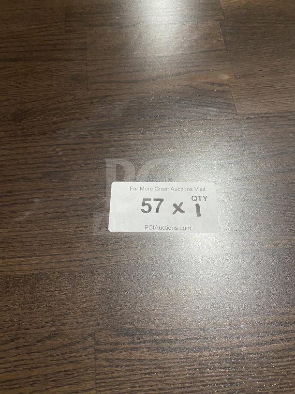 Round commercial 42" composite bar height table, brand new, suitable for indoor/outdoor use. Auction tag indicates lot 57.