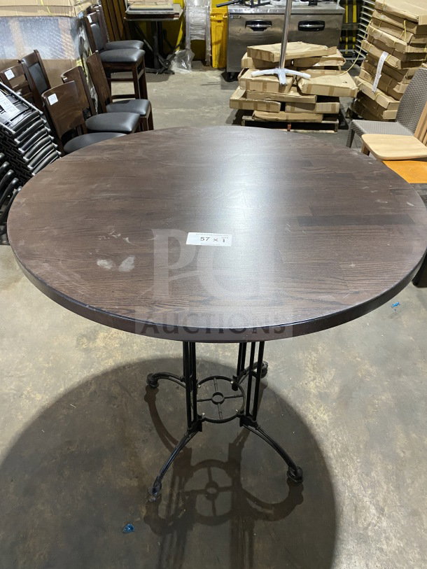 Brand new 42" round composite bar-height table, suitable for indoor/outdoor use, dark wood finish, iron base.